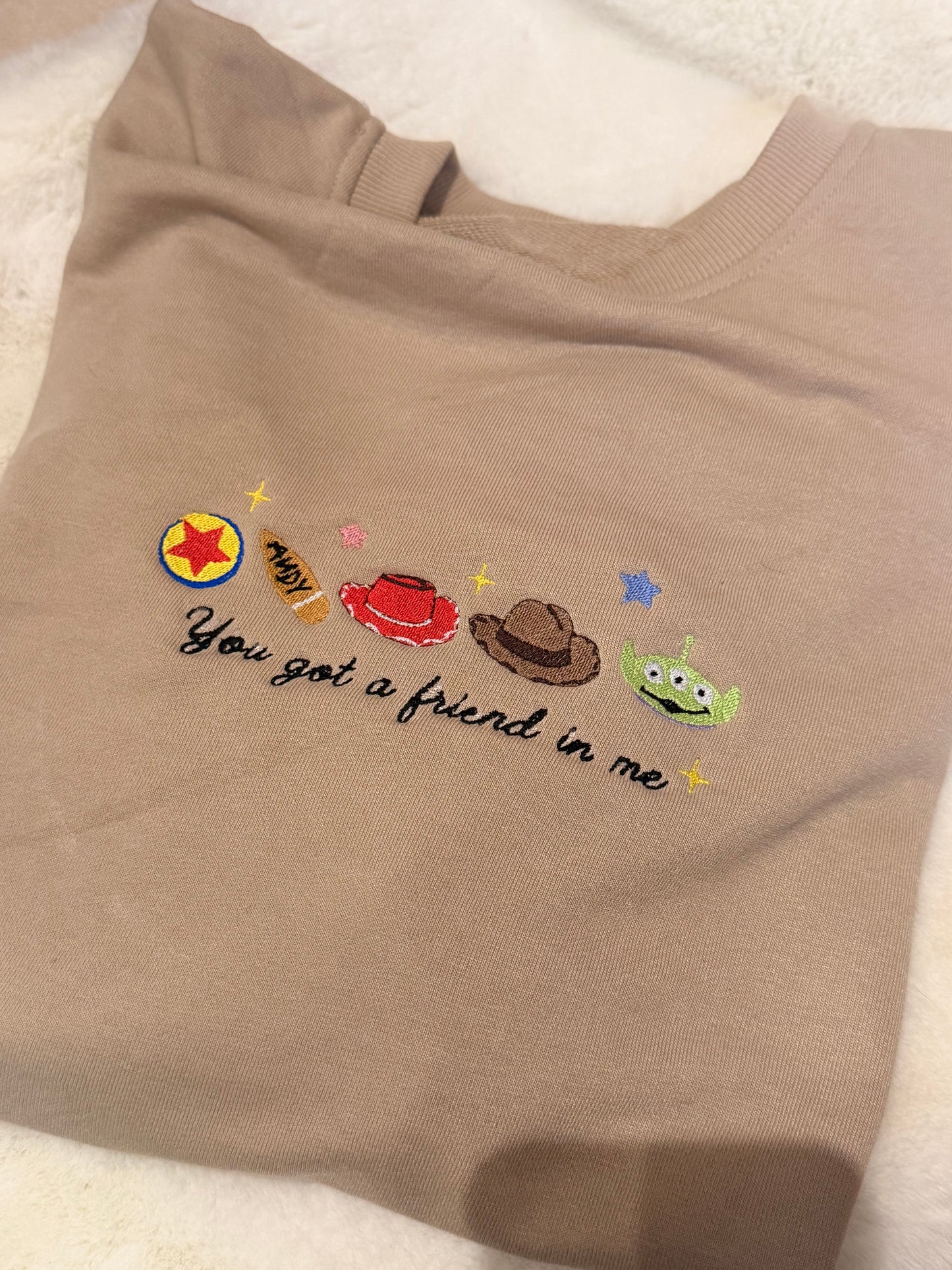 Sweat-shirt brodé beige Toy Story you got a friend in me